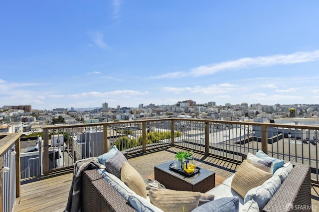 1265 Union St, San Francisco, CA 94109 - wooden deck with an outdoor living space and a city view