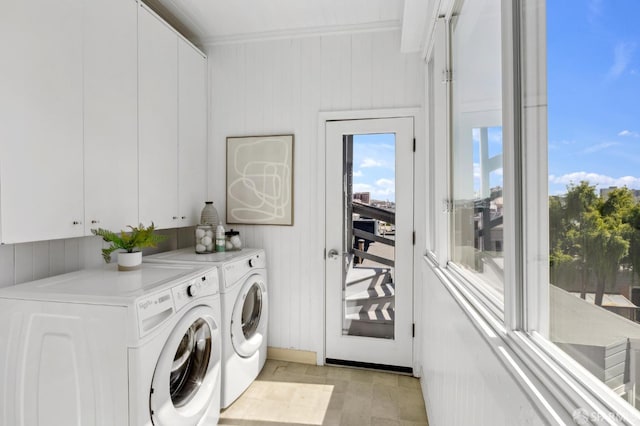 1265 Union St, San Francisco, CA 94109 - laundry area with cabinet space, independent washer and dryer, wooden walls, and crown molding
