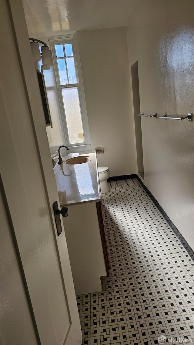 bathroom with toilet and sink