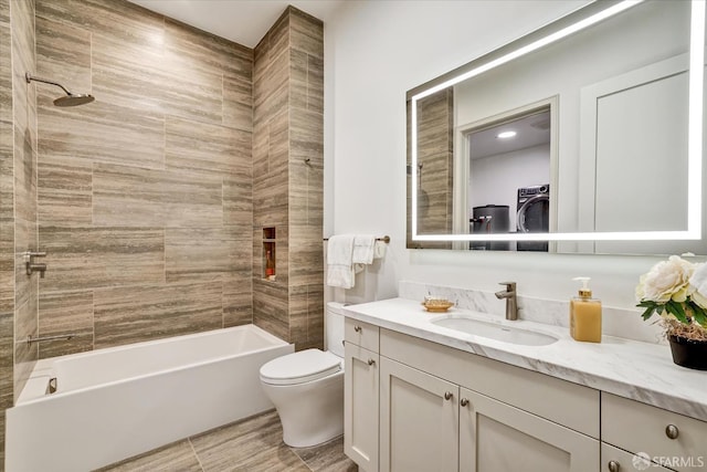 150 Eureka St, San Francisco, CA 94114 - bathroom with vanity, toilet, washtub / shower combination, washer / dryer, and wood finished floors