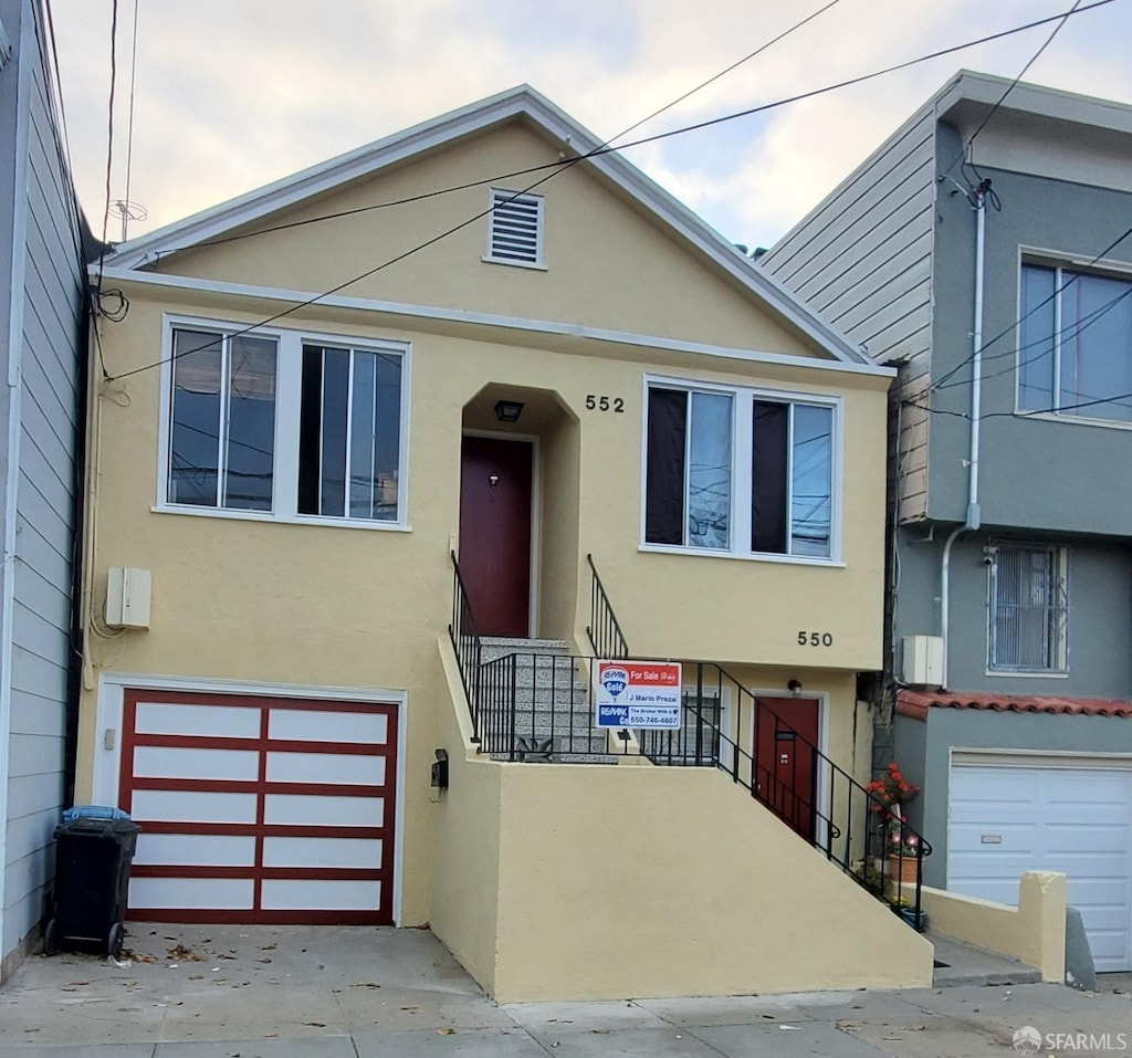 view of front of house with a garage