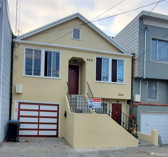 view of front of house with a garage