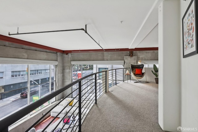 hallway with carpet flooring