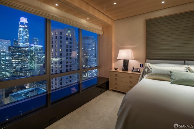 carpeted bedroom featuring wood ceiling