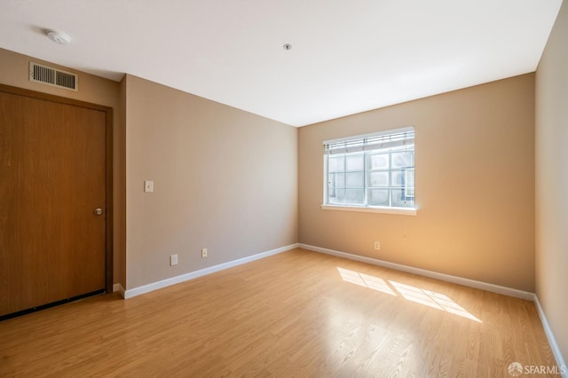 1021 San Luis Cir Unit 612, Daly City, CA 94014 - empty room featuring light wood-style floors and a smoke detector