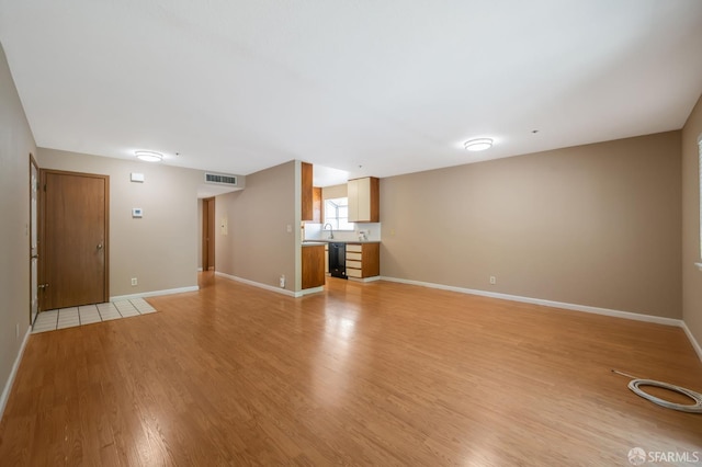 1021 San Luis Cir Unit 612, Daly City, CA 94014 - unfurnished living room featuring light wood-type flooring and baseboards