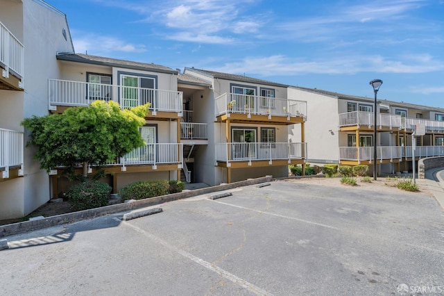 1021 San Luis Cir Unit 612, Daly City, CA 94014 - view of building exterior featuring uncovered parking