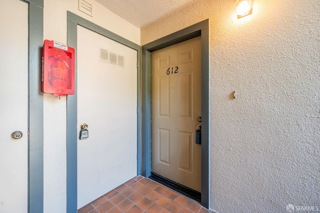 1021 San Luis Cir Unit 612, Daly City, CA 94014 - view of exterior entry featuring stucco siding