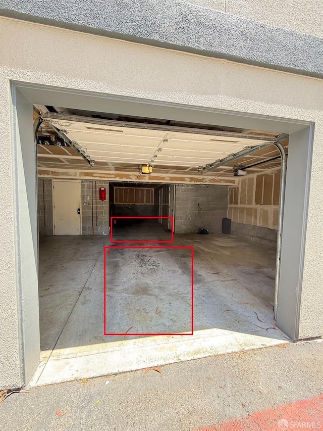1021 San Luis Cir Unit 612, Daly City, CA 94014 - garage featuring a garage door opener