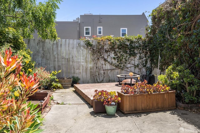 3031 20th St, San Francisco, CA 94110 - view of patio / terrace featuring fence and a wooden deck