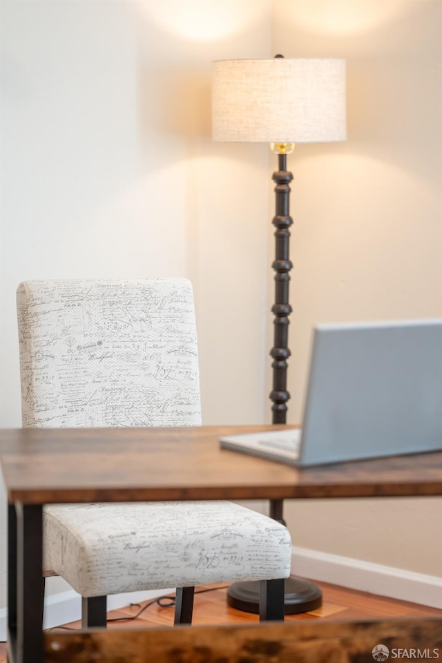 room details featuring wood finished floors and baseboards