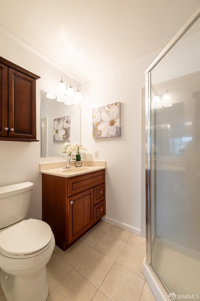 full bath with tile patterned flooring, toilet, vanity, a shower stall, and crown molding