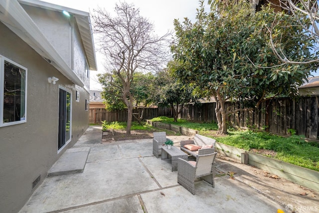 view of patio / terrace with a fenced backyard