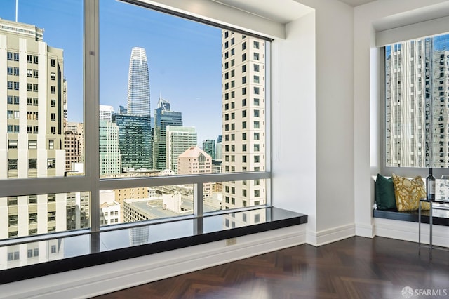 765 Market St Unit 22D, San Francisco, CA 94103 - spare room featuring baseboards and a city view