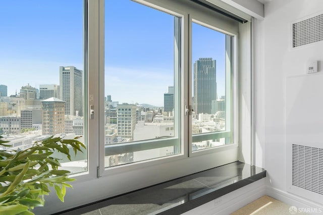 765 Market St Unit 22D, San Francisco, CA 94103 - interior space with a view of skyline and a heating unit