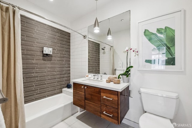 full bathroom featuring shower / bath combination with curtain, vanity, tile patterned floors, and toilet