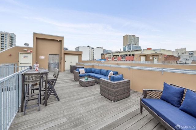 wooden deck with an outdoor hangout area