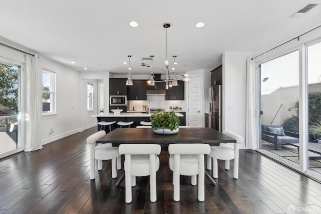 dining room featuring dark hardwood / wood-style floors