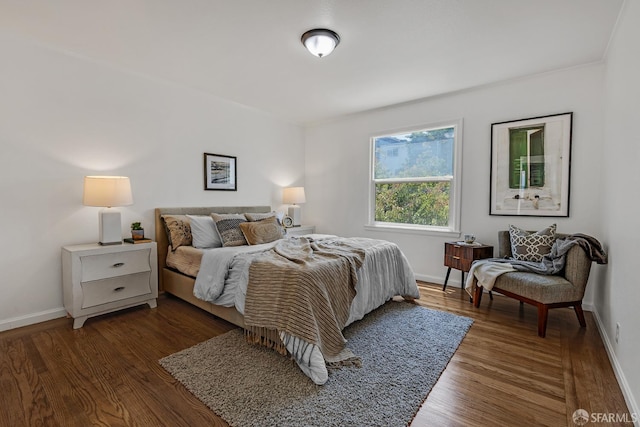 1187 Hollister St, San Francisco, CA 94124 - bedroom featuring dark wood-style flooring and baseboards