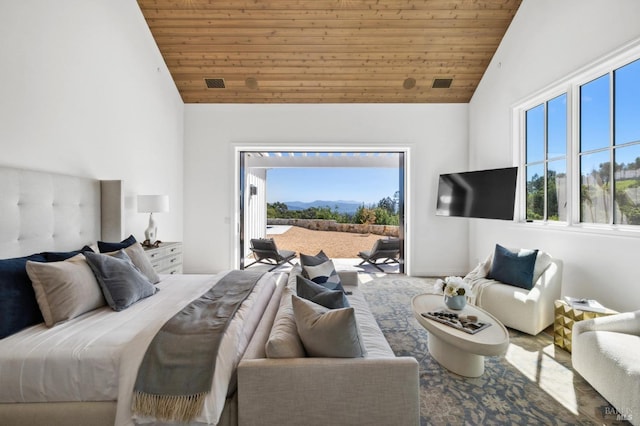 bedroom with vaulted ceiling, wood ceiling, and access to exterior