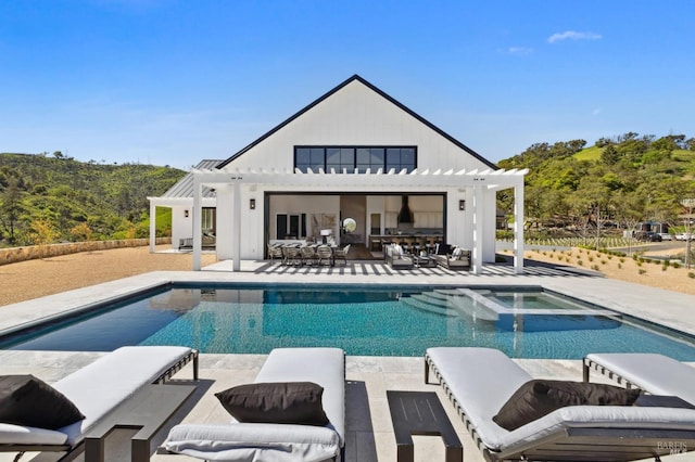 view of pool with a pergola, an in ground hot tub, and a patio