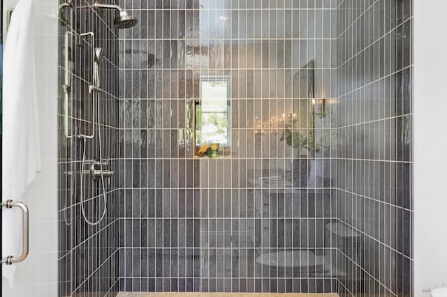 bathroom featuring an enclosed shower