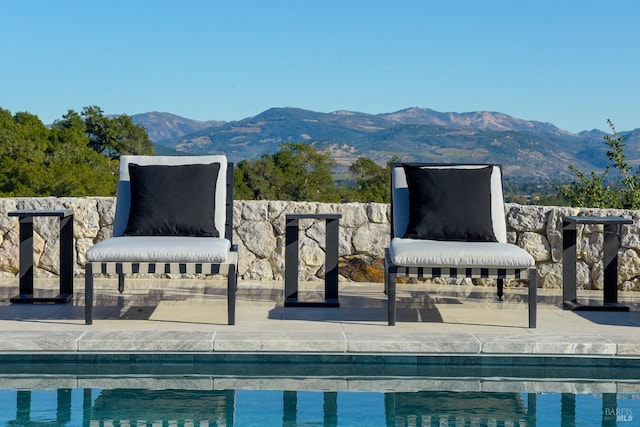 view of pool featuring a mountain view