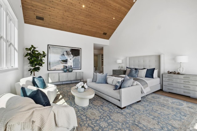 bedroom featuring high vaulted ceiling, wood-type flooring, and wooden ceiling