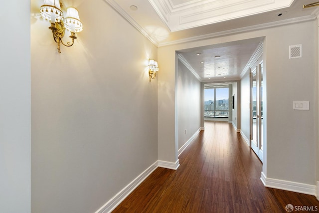 hallway featuring dark hardwood / wood-style flooring and ornamental molding