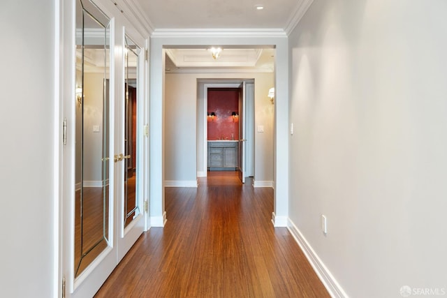 hall featuring dark hardwood / wood-style floors and ornamental molding