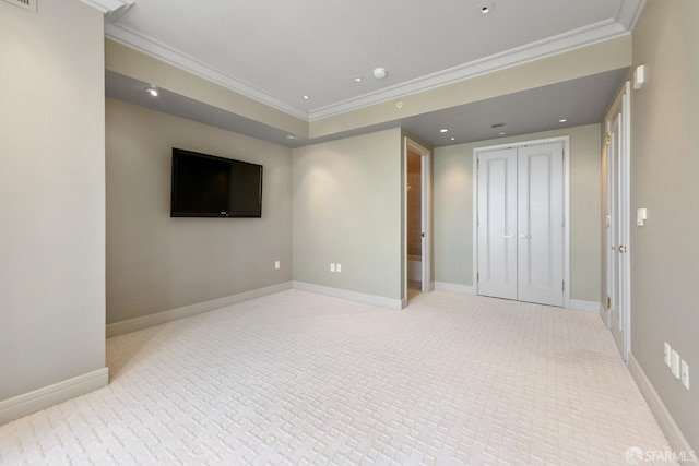 interior space featuring light colored carpet and ornamental molding