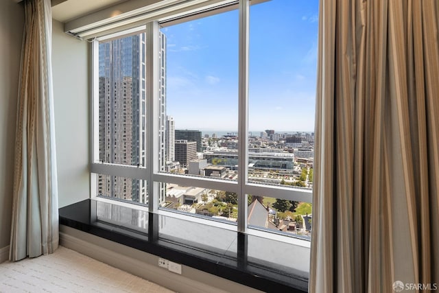 765 Market St Unit 25G, San Francisco, CA 94103 - detailed view of a city view, baseboards, and carpet