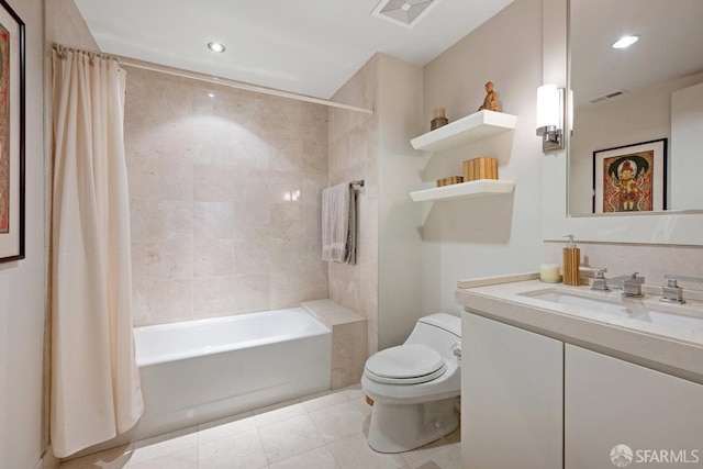 full bathroom featuring shower / bath combination with curtain, vanity, toilet, and tile patterned floors