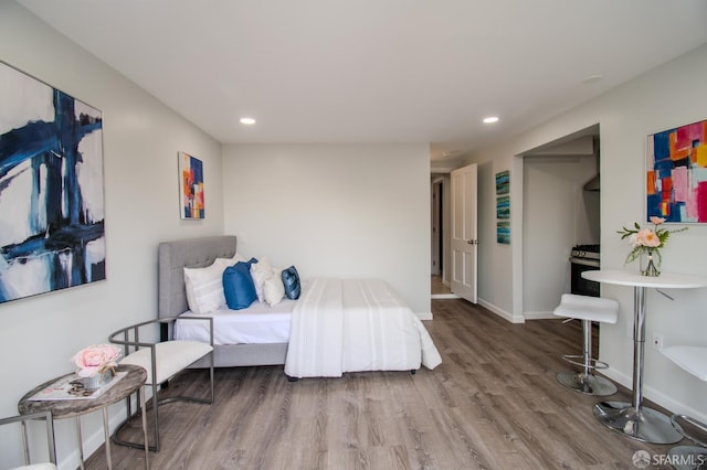 1579 46th Ave, San Francisco, CA 94122 - bedroom with wood finished floors and recessed lighting