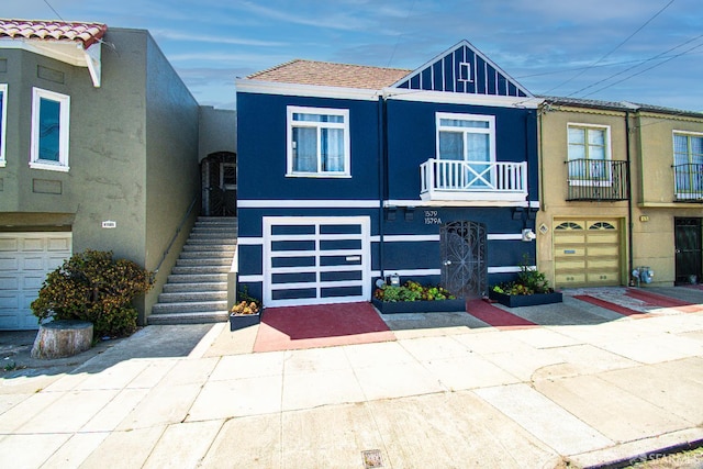 1579 46th Ave, San Francisco, CA 94122 - view of property with stucco siding and stairway