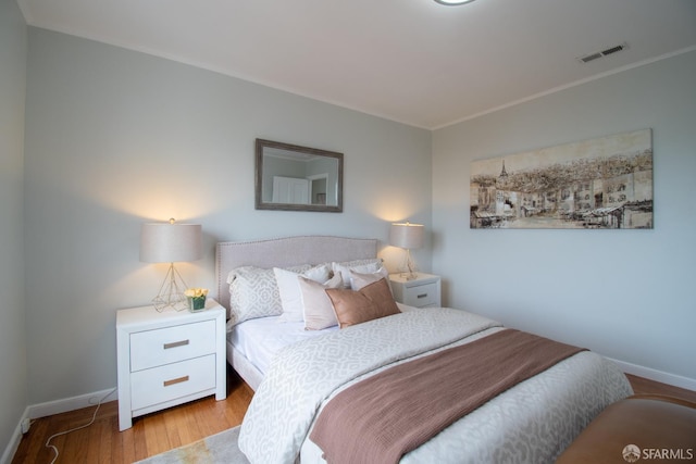 1579 46th Ave, San Francisco, CA 94122 - bedroom with wood finished floors and ornamental molding