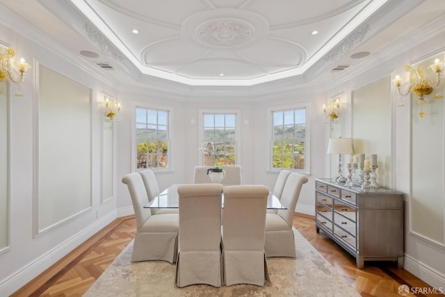 dining room featuring ornamental molding, plenty of natural light, a tray ceiling, recessed lighting, and baseboards