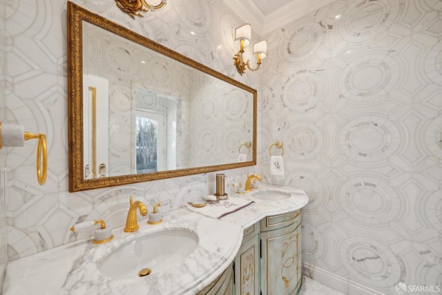 full bath with double vanity and crown molding