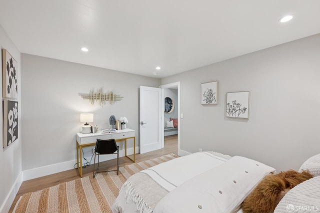 1983 15th Ave, San Francisco, CA 94116 - bedroom featuring recessed lighting, light wood finished floors, and a desk