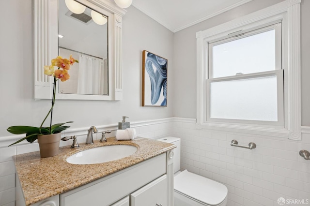 1983 15th Ave, San Francisco, CA 94116 - full bathroom with tile walls, vanity, wainscoting, and ornamental molding