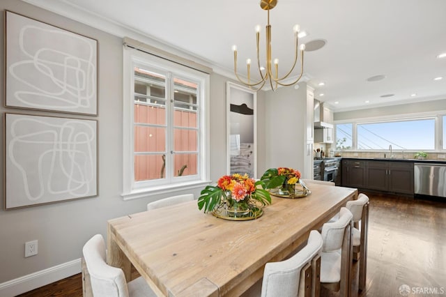 1983 15th Ave, San Francisco, CA 94116 - dining area with a chandelier, dark wood-style floors, ornamental molding, and recessed lighting