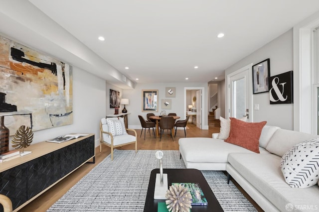 1983 15th Ave, San Francisco, CA 94116 - living room with recessed lighting, wood finished floors, and stairs