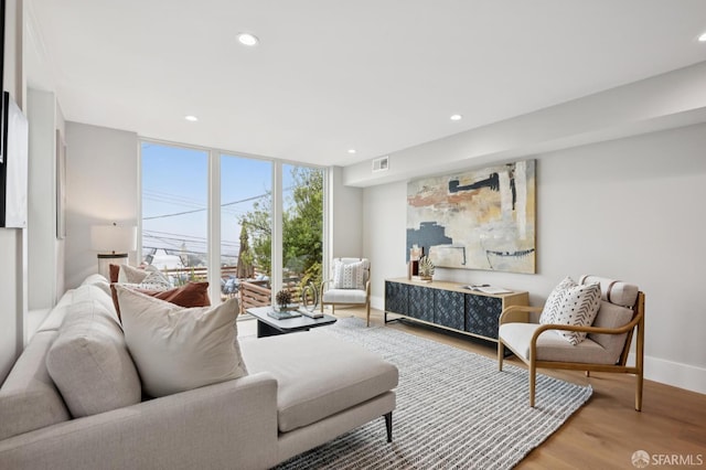 1983 15th Ave, San Francisco, CA 94116 - living area with recessed lighting, wood finished floors, and expansive windows