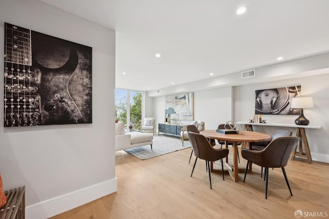 1983 15th Ave, San Francisco, CA 94116 - dining space featuring light wood finished floors and recessed lighting