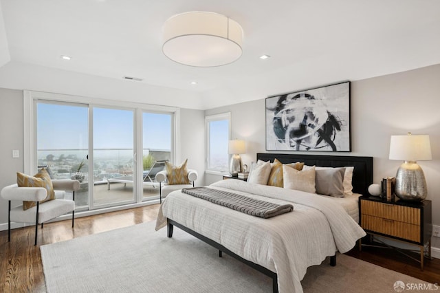 1983 15th Ave, San Francisco, CA 94116 - bedroom featuring access to exterior, wood finished floors, and recessed lighting