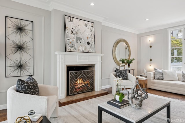 1983 15th Ave, San Francisco, CA 94116 - living area featuring a lit fireplace, ornamental molding, wood finished floors, and recessed lighting