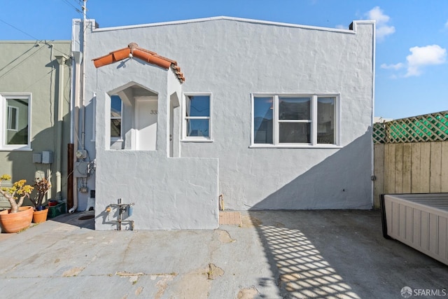 view of front of house with a patio area