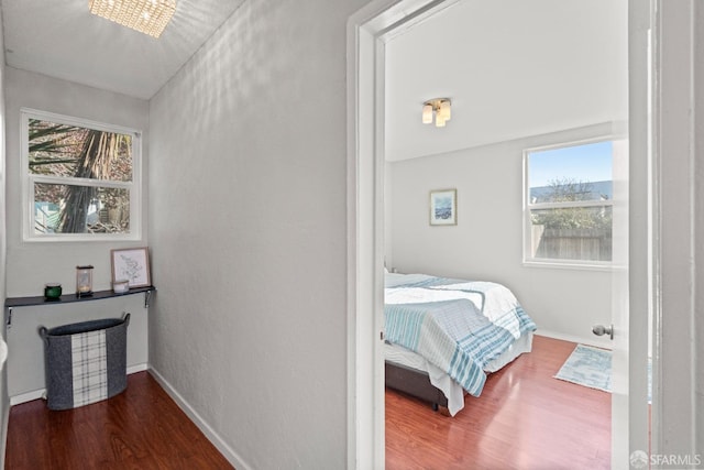 bedroom featuring wood-type flooring