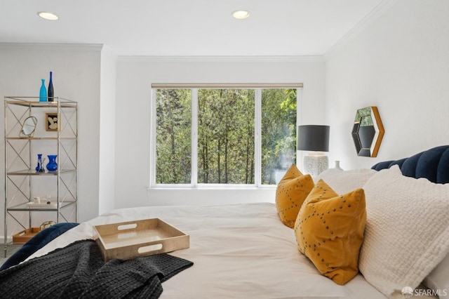 bedroom featuring crown molding and recessed lighting