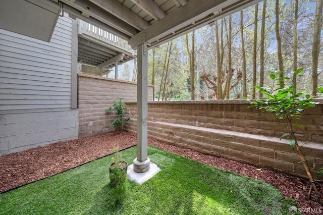 view of yard featuring fence